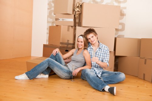 Professional movers handling furniture during house removals in Littleilford
