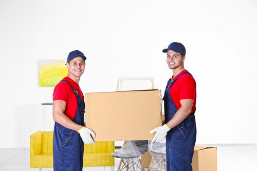 Staff reviewing a customer concern in a storage office