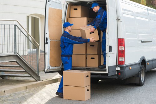 Staff moving items safely at Littleilford Storage