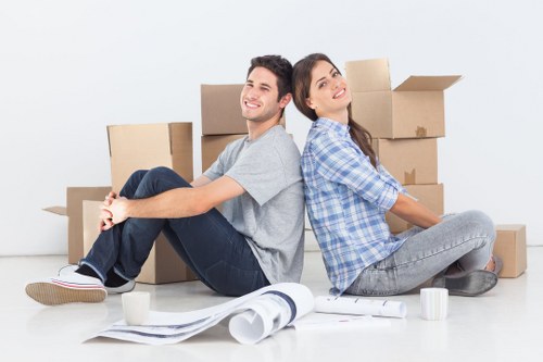 Unloading boxes at a new home during house removals in Littleilford