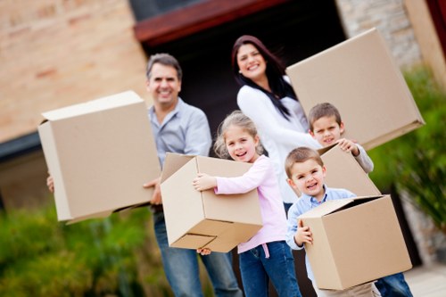 Professional movers handling furniture for a Littleilford relocation