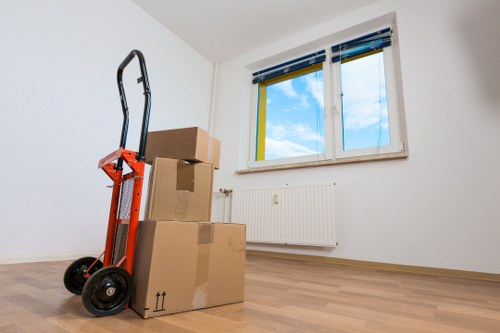 Professional movers handling furniture in Littleilford